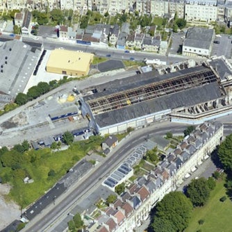 Aerial view of Bath showing the unrestored Green Park Station and Green Park Buildings 1981